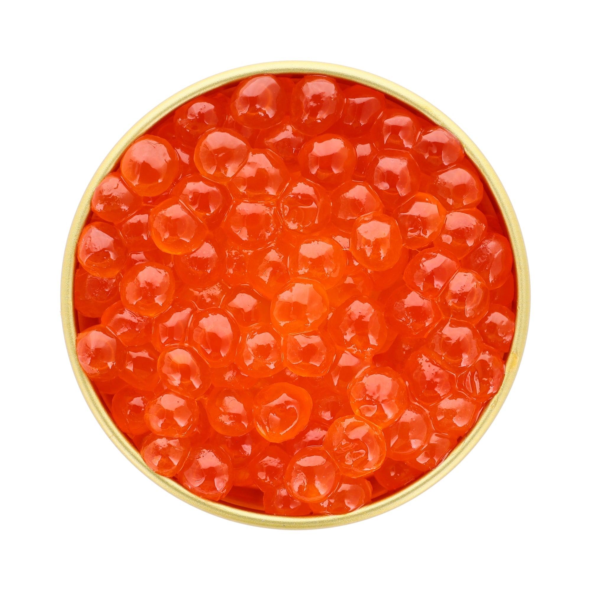 large salmon roe, bright orange color, delicate skin perfect for sushi
